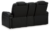 Caveman Den Midnight Dual Power Reclining Loveseat by Ashley at Eve Furniture