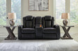 Caveman Den Midnight Dual Power Reclining Loveseat by Ashley at Eve Furniture