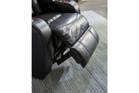 Caveman Den Midnight Dual Power Reclining Sofa and Loveseat by Ashley at Eve Furniture