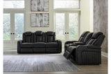 Caveman Den Midnight Dual Power Reclining Sofa and Loveseat by Ashley at Eve Furniture