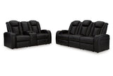 Caveman Den Midnight Dual Power Reclining Sofa and Loveseat by Ashley at Eve Furniture