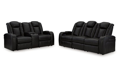 Caveman Den Midnight Dual Power Reclining Sofa and Loveseat by Ashley at Eve Furniture