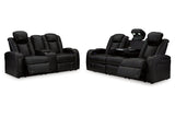 Caveman Den Midnight Dual Power Reclining Sofa and Loveseat by Ashley at Eve Furniture