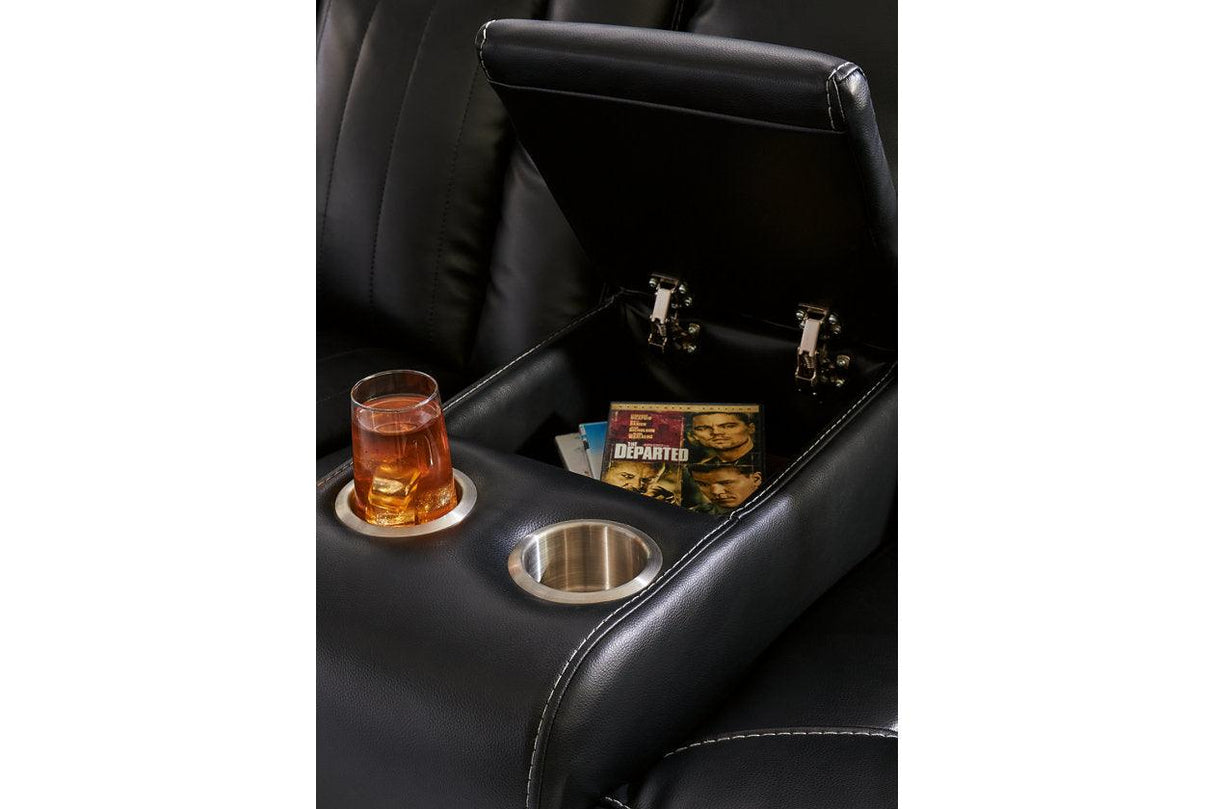 Caveman Den Midnight Dual Power Reclining Sofa and Loveseat by Ashley at Eve Furniture