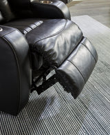 Caveman Den Midnight Dual Power Reclining Sofa by Ashley at Eve Furniture
