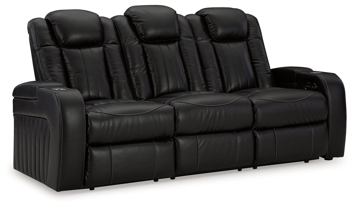 Caveman Den Midnight Dual Power Reclining Sofa by Ashley at Eve Furniture