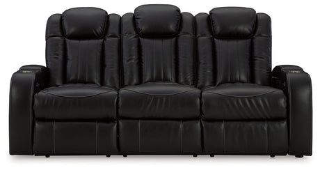 Caveman Den Midnight Dual Power Reclining Sofa by Ashley at Eve Furniture