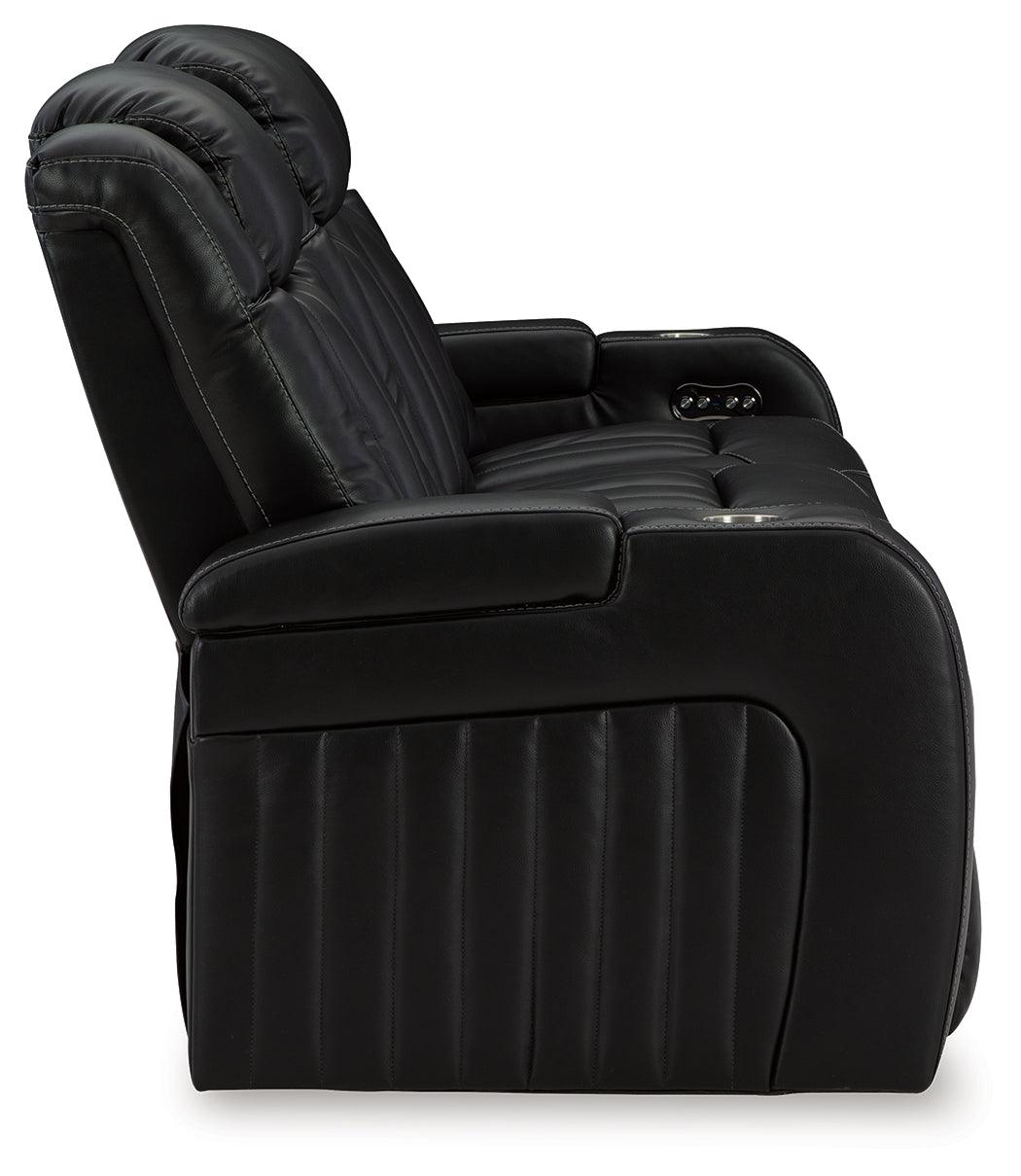 Caveman Den Midnight Dual Power Reclining Sofa by Ashley at Eve Furniture
