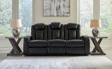 Caveman Den Midnight Dual Power Reclining Sofa by Ashley at Eve Furniture
