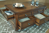 Channley Brown Lift-Top Coffee Table by Ashley at Eve Furniture