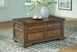 Channley Brown Lift-Top Coffee Table by Ashley at Eve Furniture