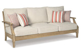 Clare View Beige Sofa with Cushion by Ashley at Eve Furniture