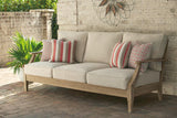 Clare View Beige Sofa with Cushion by Ashley at Eve Furniture
