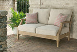 Clare View Beige Loveseat with Cushion by Ashley at Eve Furniture