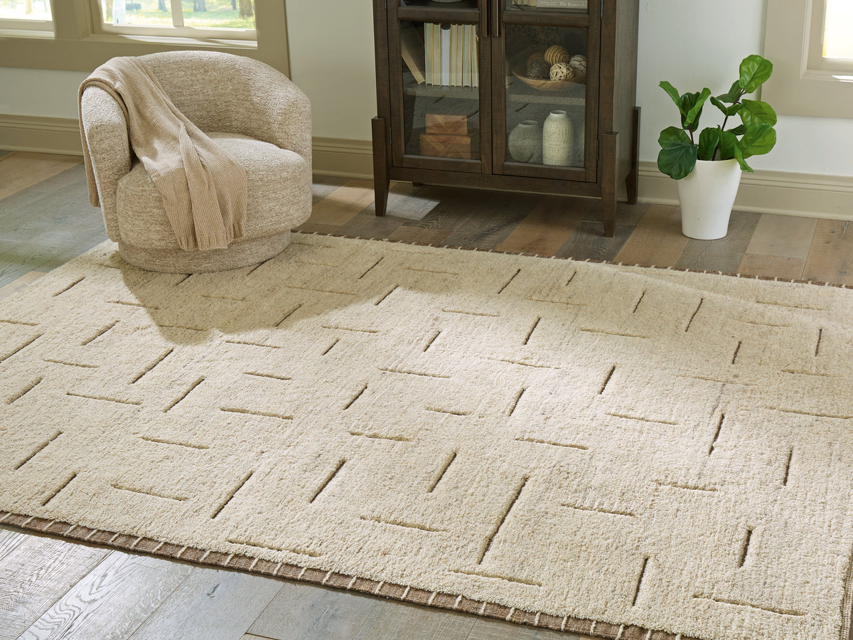 Clayman Beige/Brown Large Rug by Ashley at Eve Furniture