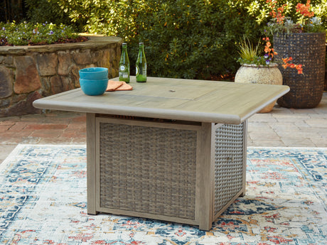 Cliff Trails Beige Fire Pit Table by Ashley at Eve Furniture