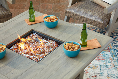Cliff Trails Beige Fire Pit Table by Ashley at Eve Furniture