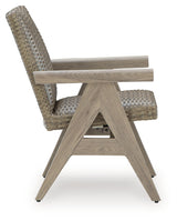 Cliff Trails Beige Outdoor Rocking Arm Chair by Ashley at Eve Furniture