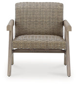 Cliff Trails Beige Outdoor Rocking Lounge Chair by Ashley at Eve Furniture