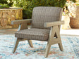 Cliff Trails Beige Outdoor Rocking Lounge Chair by Ashley at Eve Furniture