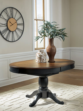 Clorazi Black/Brown Dining Butterfly Extension Table by ASHLEY FURNITURE at Eve Furniture