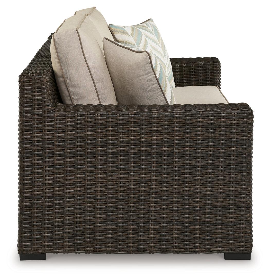 Coastline Bay Brown Outdoor Loveseat with Cushion by Ashley at Eve Furniture