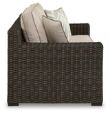 Coastline Bay Brown Outdoor Loveseat with Cushion by Ashley at Eve Furniture