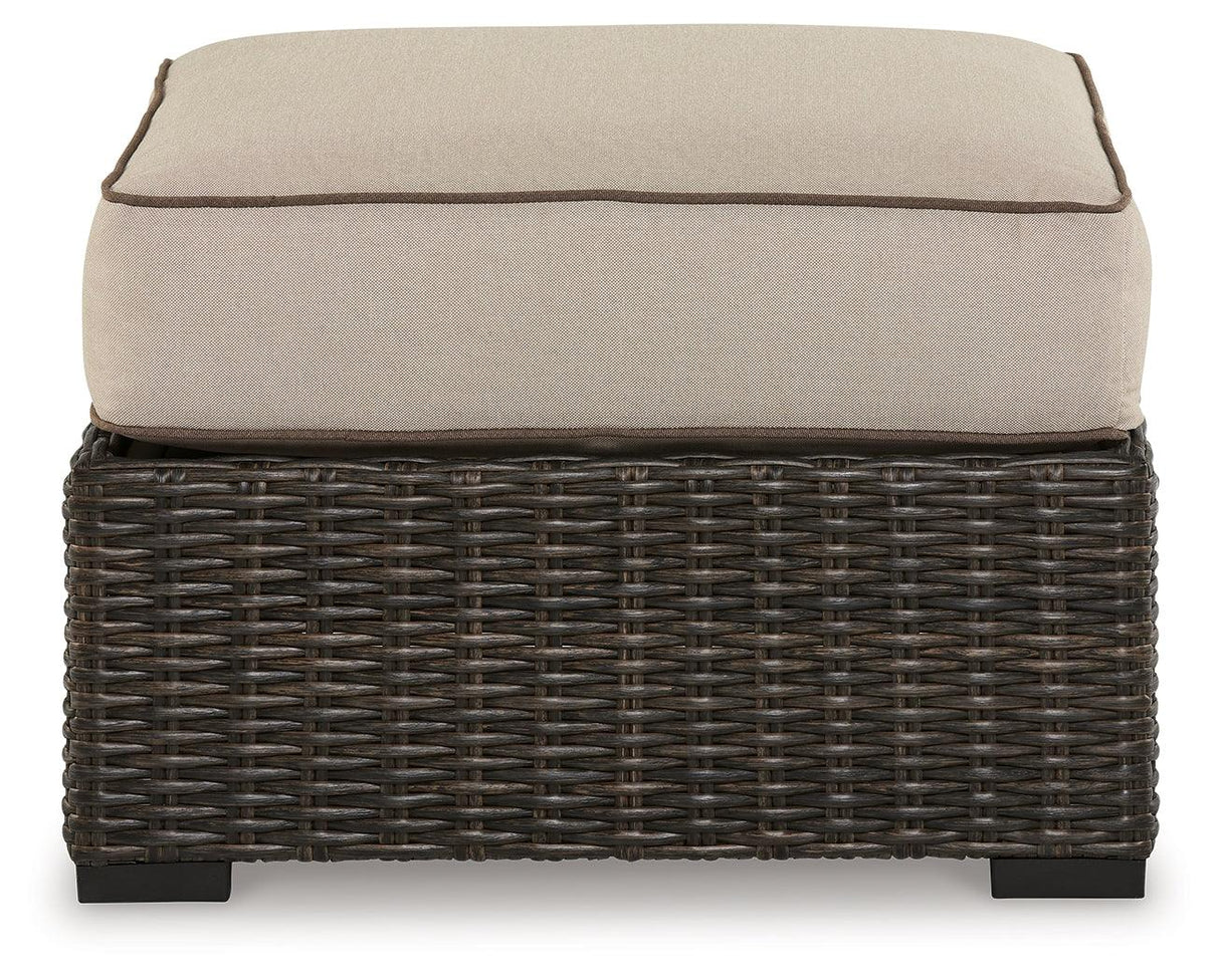 Coastline Bay Brown Outdoor Ottoman with Cushion by Ashley at Eve Furniture