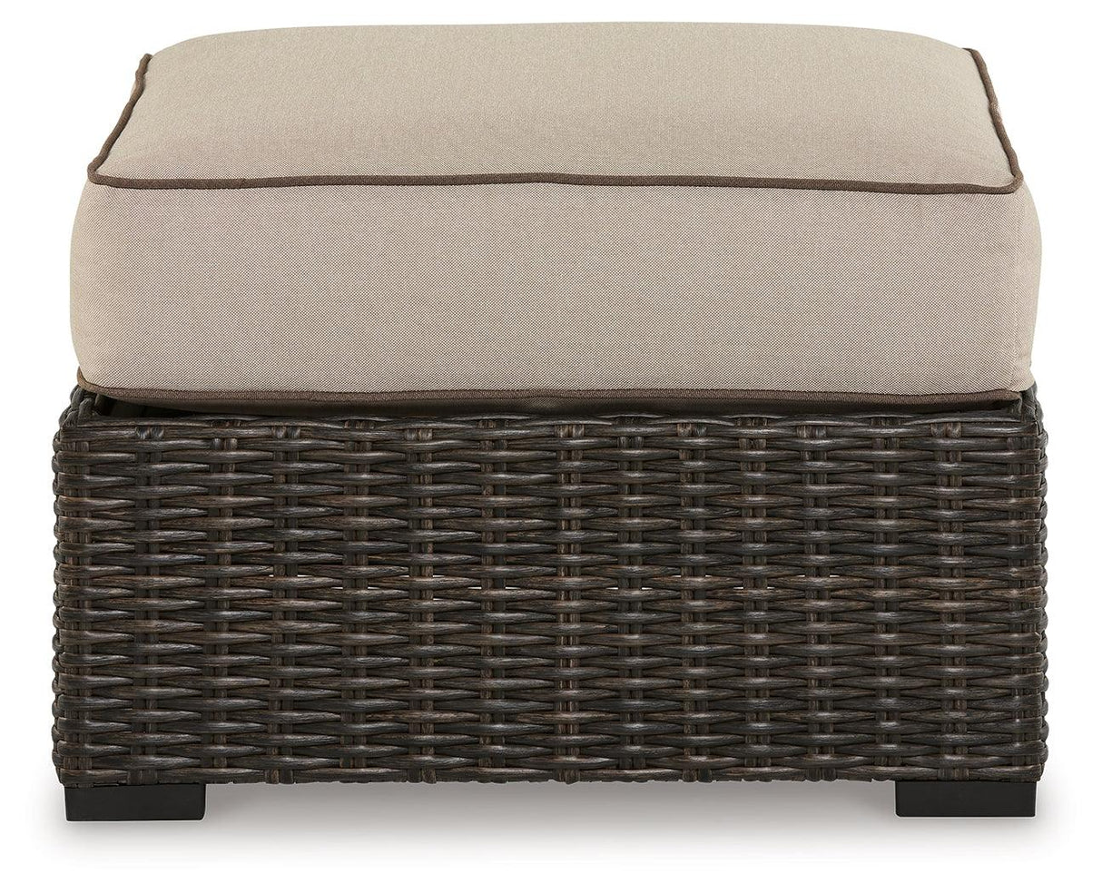 Coastline Bay Brown Outdoor Ottoman with Cushion by Ashley at Eve Furniture