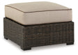 Coastline Bay Brown Outdoor Ottoman with Cushion by Ashley at Eve Furniture