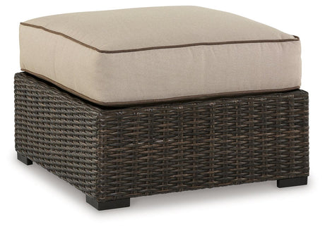 Coastline Bay Brown Outdoor Ottoman with Cushion by Ashley at Eve Furniture