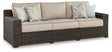 Coastline Bay Brown Outdoor Sofa with Cushion by Ashley at Eve Furniture
