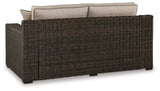 Coastline Bay Brown Outdoor Loveseat with Cushion by Ashley at Eve Furniture