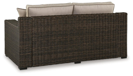 Coastline Bay Brown Outdoor Loveseat with Cushion by Ashley at Eve Furniture