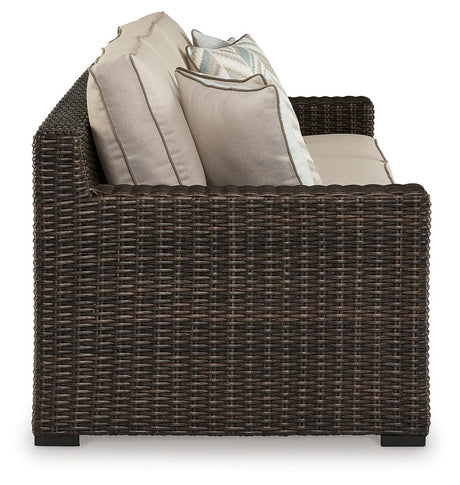 Coastline Bay Brown Outdoor Sofa with Cushion by Ashley at Eve Furniture