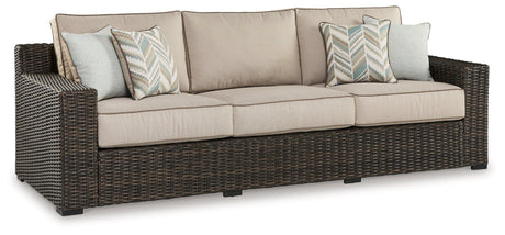 Coastline Bay Brown Outdoor Sofa with Cushion by Ashley at Eve Furniture