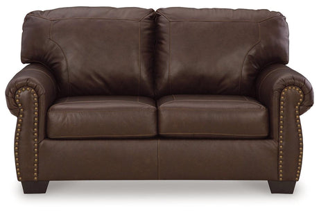 Colleton Dark Brown Sofa, Loveseat and Recliner by Ashley at Eve Furniture