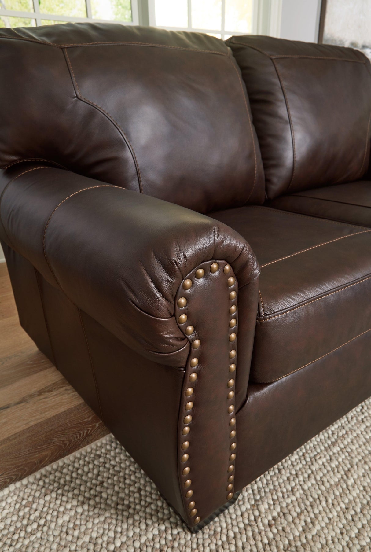 Colleton Dark Brown Loveseat by Ashley at Eve Furniture