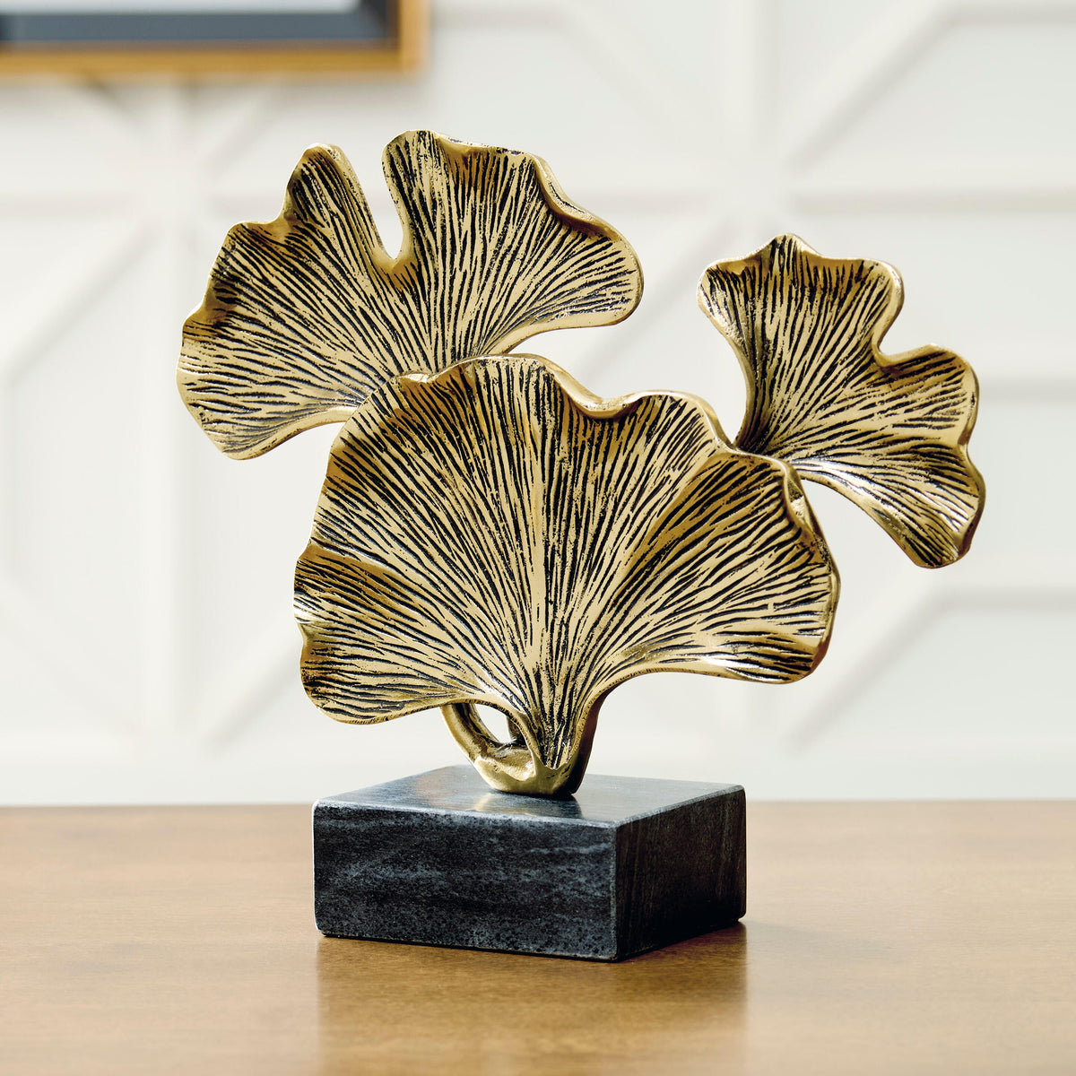 Collridge Gold Finish/Black Sculpture by Ashley at Eve Furniture