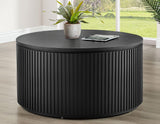 Colvin 36″ Round Castered Coffee Table, Black Finish by Steve Silver at Eve Furniture