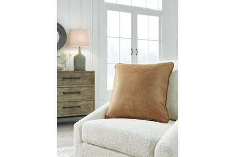 Cortnie Caramel Pillow by Ashley at Eve Furniture