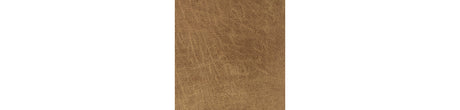 Cortnie Caramel Pillow by Ashley at Eve Furniture