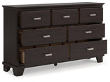 Covetown Dark Brown Dresser by Ashley at Eve Furniture