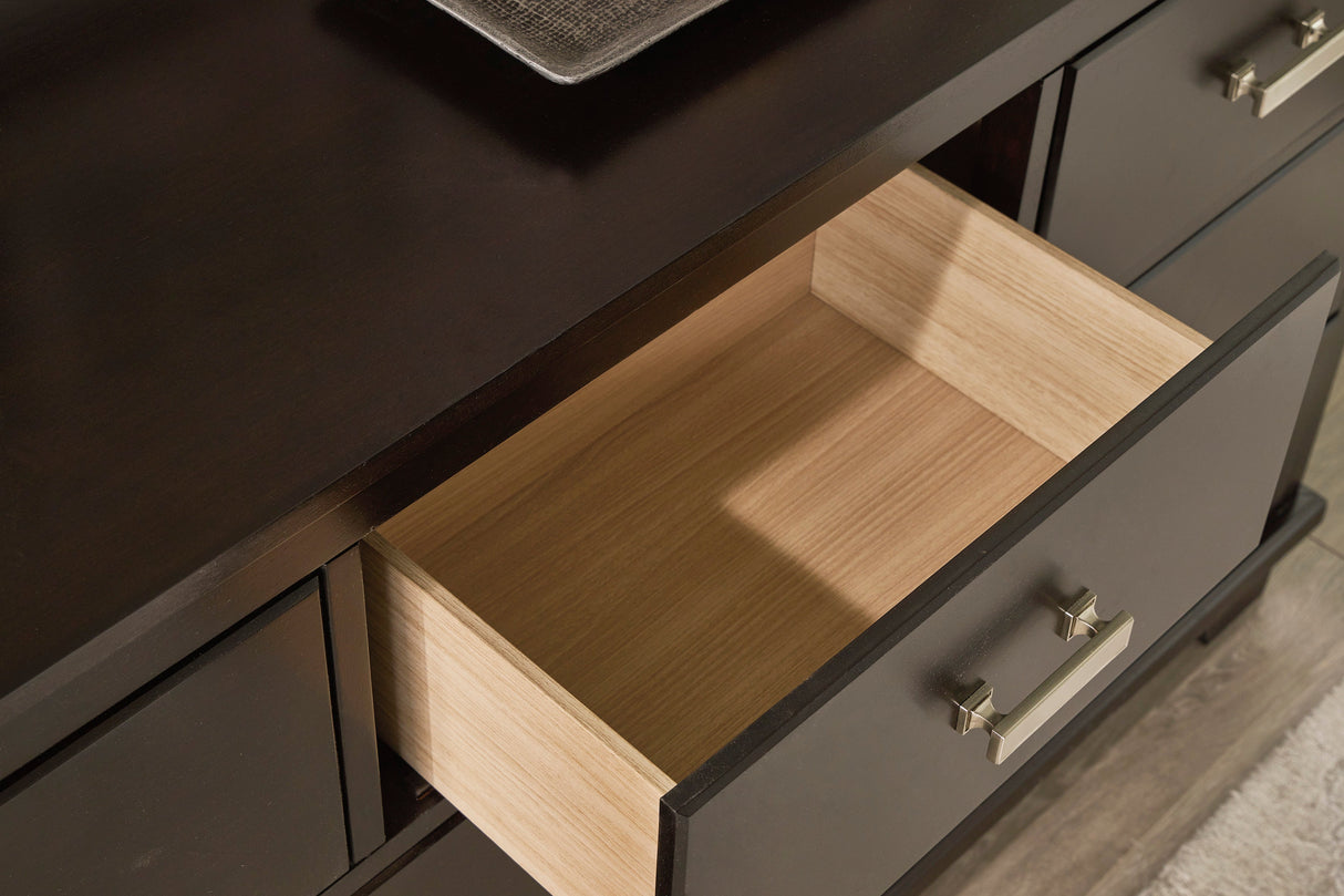 Covetown Dark Brown Panel Bedroom Set by Ashley at Eve Furniture