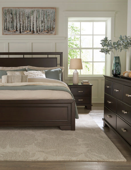 Covetown Dark Brown Panel Bedroom Set by Ashley at Eve Furniture