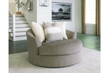 Creswell Stone Oversized Swivel Accent Chair by Ashley at Eve Furniture