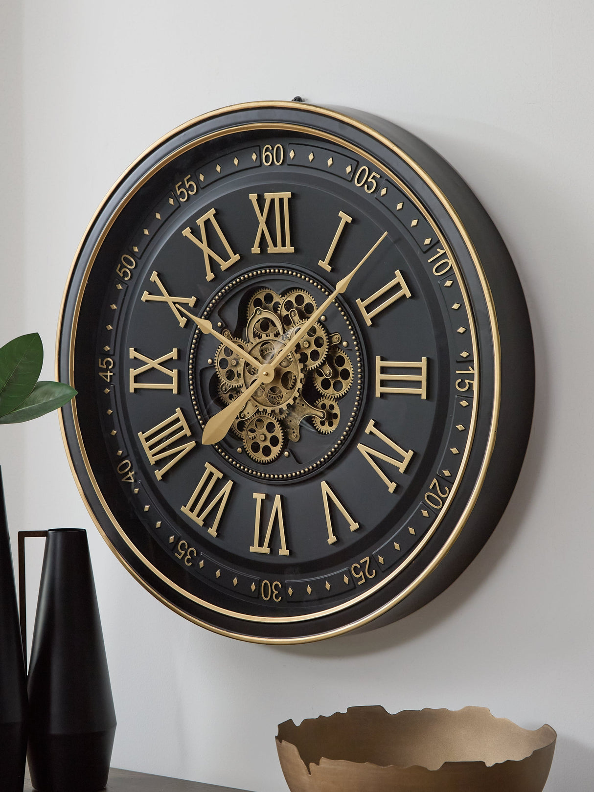 Dairton Black/Gold Finish Wall Clock by Ashley at Eve Furniture