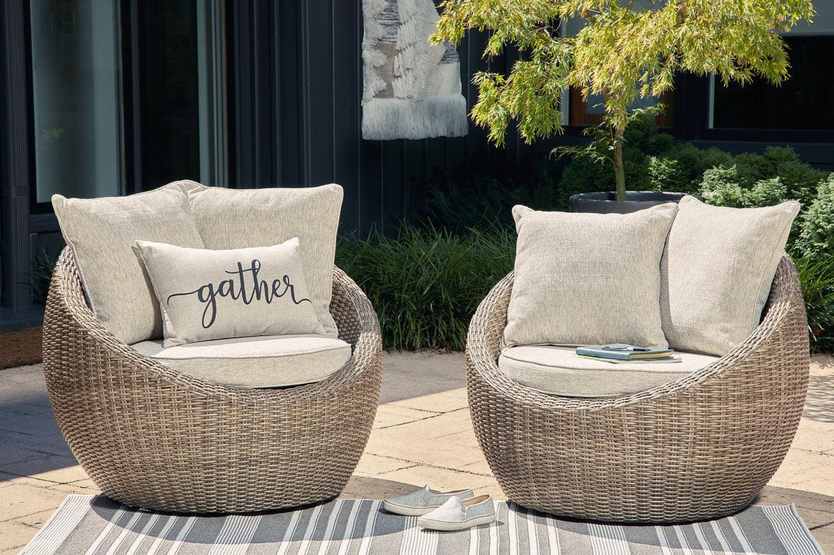 Danson Beige Outdoor Swivel Lounge Chair (Set of 2) by Ashley at Eve Furniture