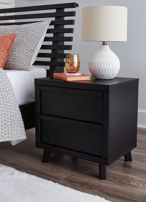 Danziar Black Nightstand by Ashley at Eve Furniture