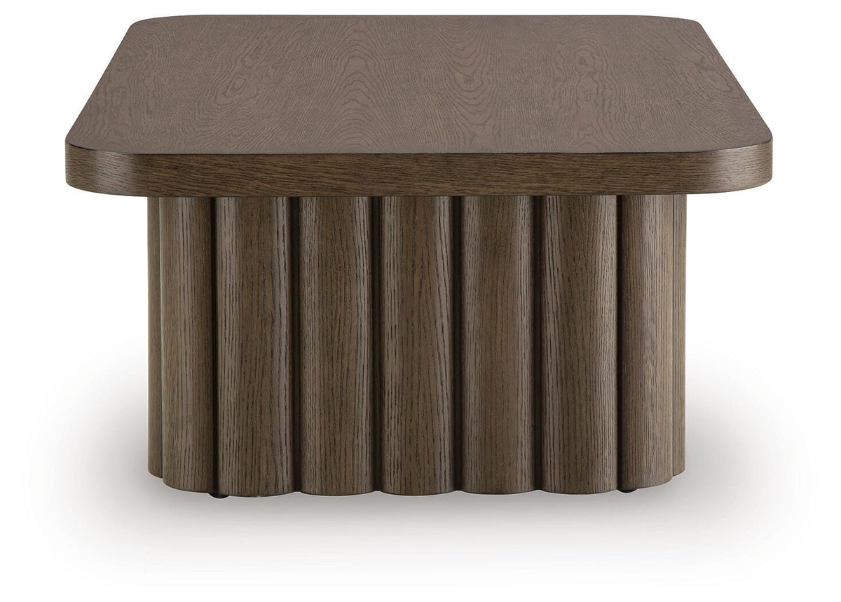 Darimore Burnished Brown Coffee Table by Ashley at Eve Furniture